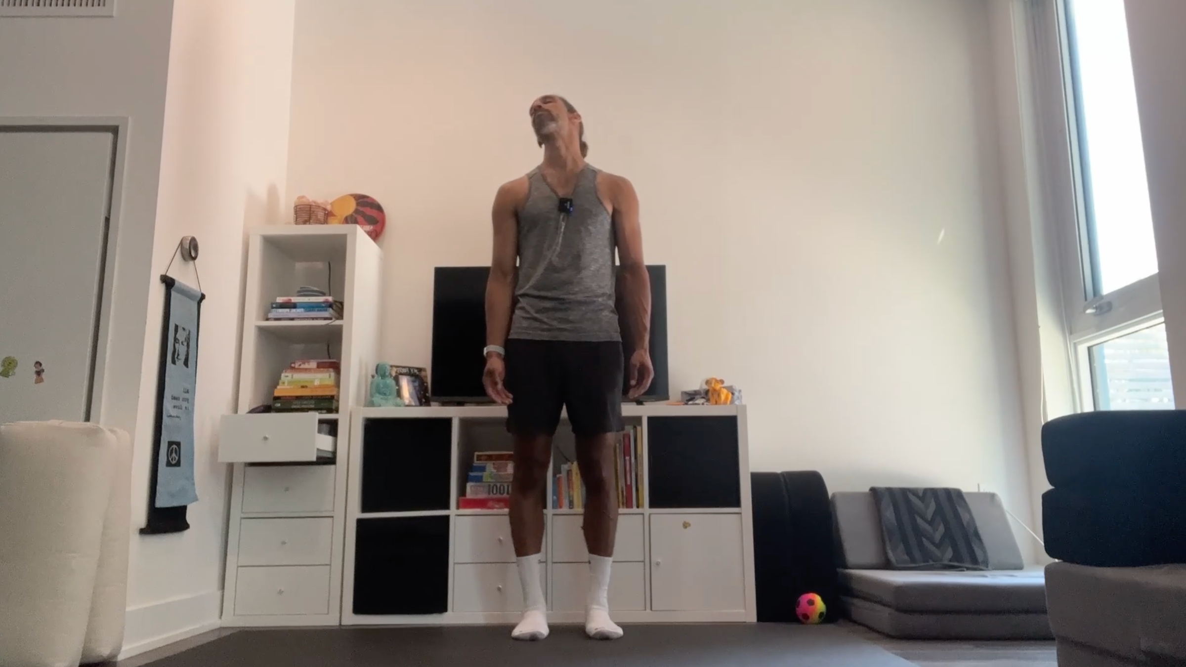 Yoga teacher Jaffer Hussain doing neck circles